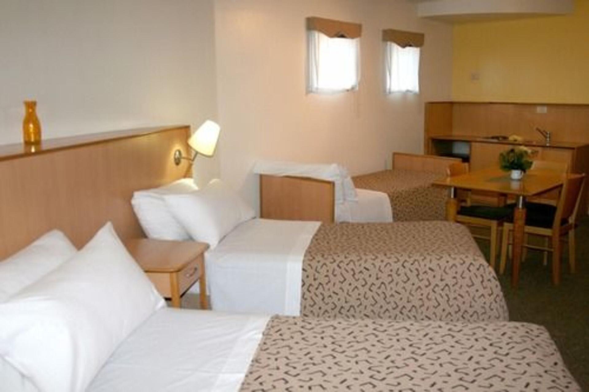 URBANA SUITES — 6
