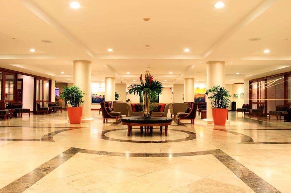 HOTEL PLAZA SUITES — 7